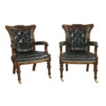 A pair of mahogany library armchairs,