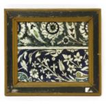 An Isnik pottery tile panel,