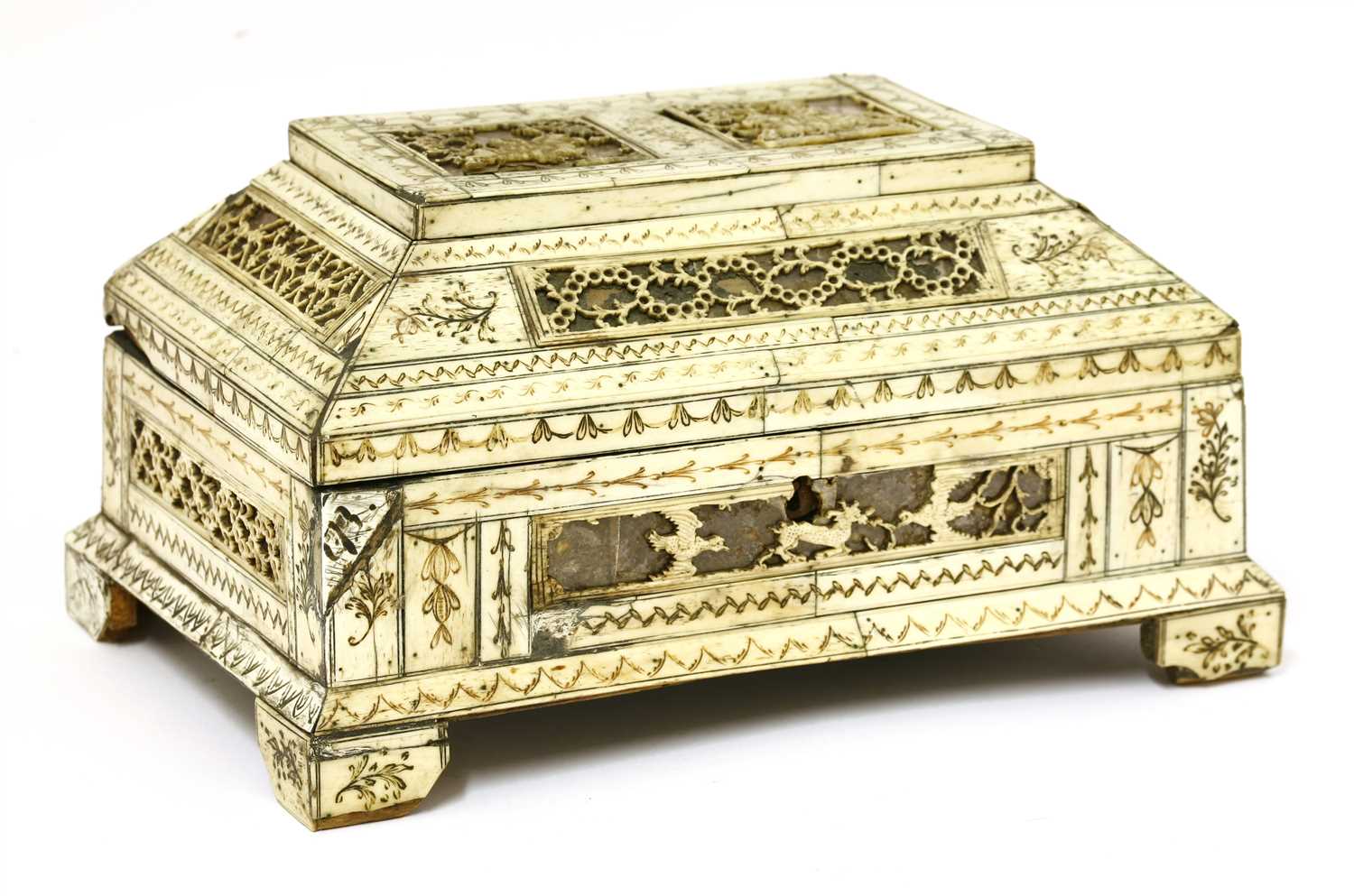 A Russian carved bone, foil and mica casket,
