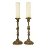 A pair of French pewter silver-plated pricket candlesticks,