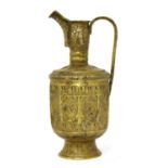 A Persian brass inlaid spouted ewer,