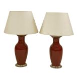 A pair of Chinese sang-de-boeuf style table lamps,