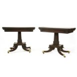 A pair of Regency mahogany card tables,