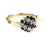 A sapphire and diamond cluster ring,