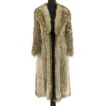 A wolf full length fur coat,