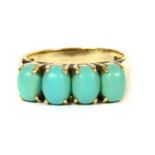 A 9ct gold four stone reconstituted turquoise ring,