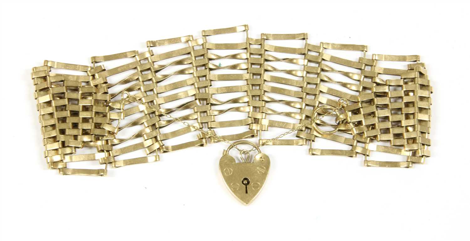 A 9ct gold ten row gate bracelet,