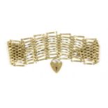 A 9ct gold ten row gate bracelet,