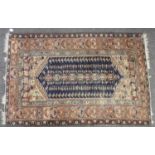 A hand knotted Persian rug