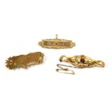 Three gold brooches,