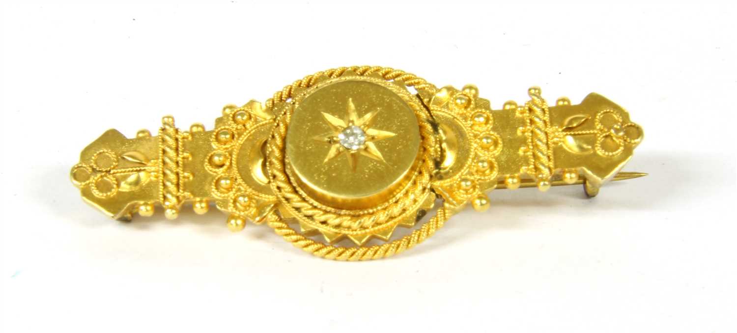 A 15ct gold Etruscan revival bar brooch,