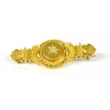A 15ct gold Etruscan revival bar brooch,