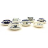 A collection of 18th century blue and white tea bowls and saucers,