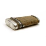 A white metal and shagreen lancet case of tapering form,