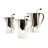 A set of three silver plated Asprey bean terminal coffee and milk pots,