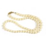 A single row uniform cultured pearl necklace,