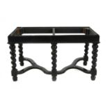 A 17th century style ebonised cabinet base,