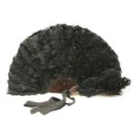An Ostrich feather and tortoise shell fan