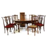 A mahogany wind out extending dining table by Waring,