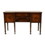 A Victorian strung mahogany sideboard the inverted front with two drawers,