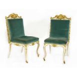 A pair of parcel gilt Chippendale-style side chairs,