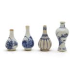 Four blue and white snuff bottles