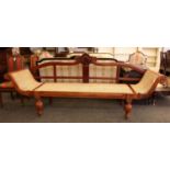 A Regency style bergere settee,