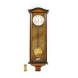 A walnut and parquetry inlaid Vienna-type wall clock,