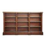 A Victorian oak and parcel-gilt three section open bookcase,