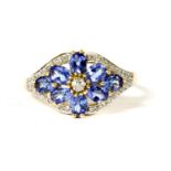 A 14ct gold tanzanite and diamond floral cluster ring,
