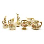 A collection of Royal Worcester ivory and gilt porcelain items,
