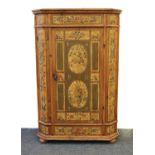 An early 19th century Continental pine cupboard,