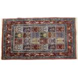 An Eastern pictorial rug,