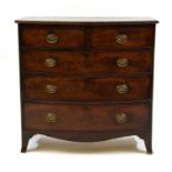 A Victorian mahogany bow front chest of two short and three long drawers on bracket feet,
