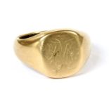 A gold signet ring,