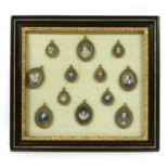 A collection of gilt framed photo gravure miniature portraits