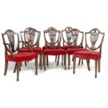 A set of four George mahogany Hepplewhite style shield back chairs,