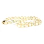 A 9ct gold single row uniform cultured baroque pearl necklace,