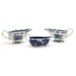 A pair of 18th century blue and white sauce boats,