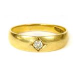 A gold single stone diamond ring gypsy,