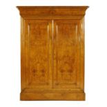 A large Continental burr ash armoire,