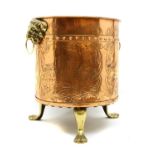 A copper log bin