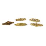 Five gold bar brooches,