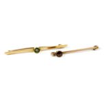 A gold aquamarine bar brooch,