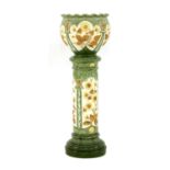 A late Victorian Burmantofts ‘faience’ jardinière and pedestal,