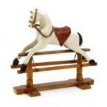 An early 19th century rocking horse,