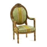 A Louis XV1 style gilt wood fauteuil,