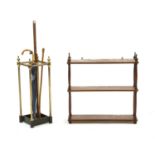 A Victorian brass stickstand with divisioned centre,