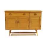 An Ercol mid century elm sideboard,