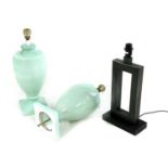 A pair of green glazed porcelain table lamps of baluster form,